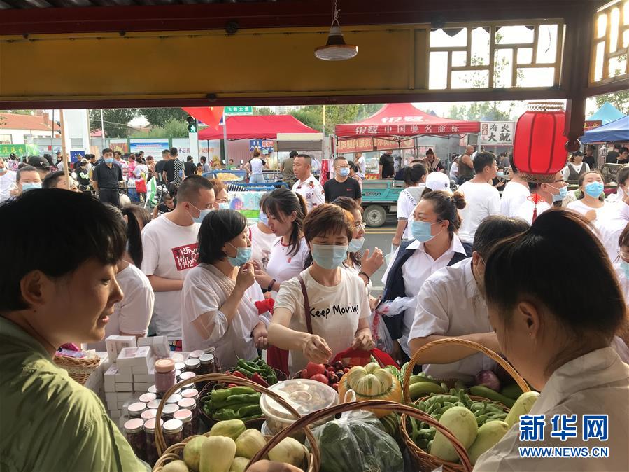 脱贫攻坚｜扶贫夜市让小城"烟火气"升腾"致富味"
