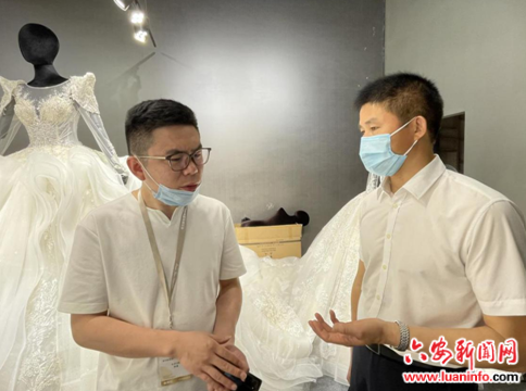 裕安丁集：卢俊赴上海国际婚纱展览会开展招商活动