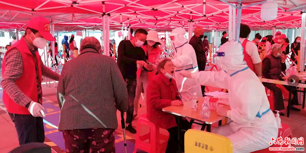 社区吹哨 党员报到 筑牢疫情防控严密防线